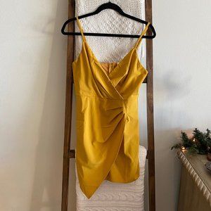 NWOT Blue Blush yellow asymmetrical bodycon mini dress